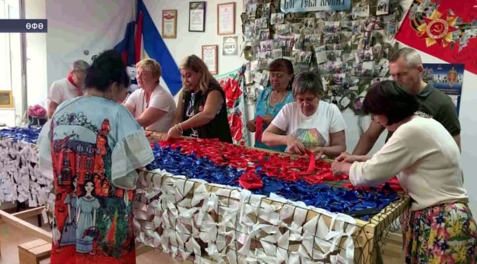 Башҡортостан ирекмәндәре яугирҙар өсөн Рәсәй флагын үрә